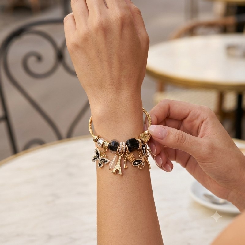 PULSERA DE ENCHAPE PARA DAMA CON DISEÑO DE MARIPOSA, TORRE EIFFEL Y MARIPOSA 6CM