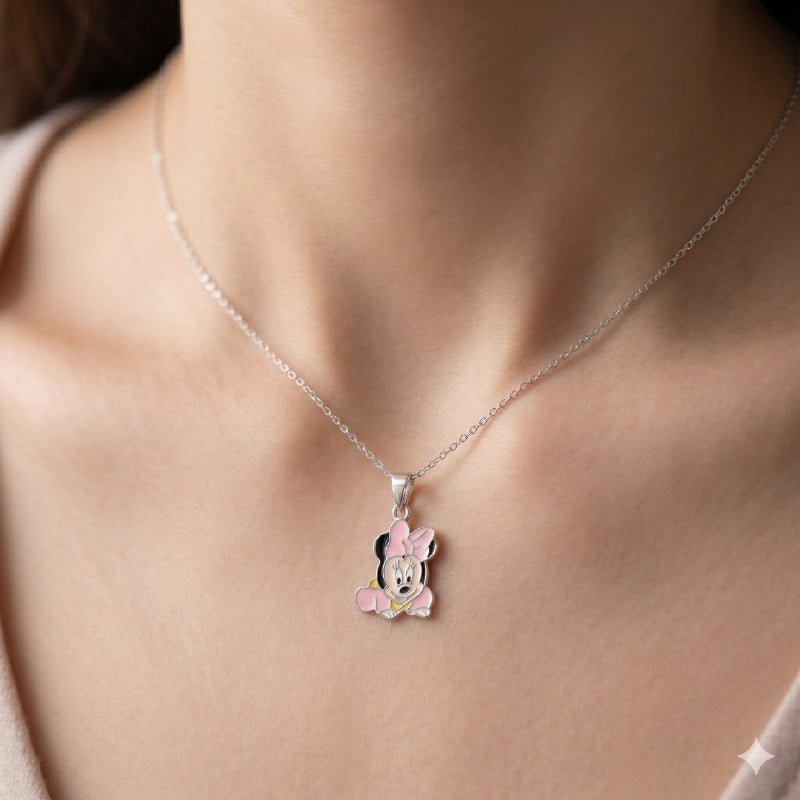 DIJE EN FORMA DE MINNIE MOUSE DE PLATA 9.25 PESO: 3G