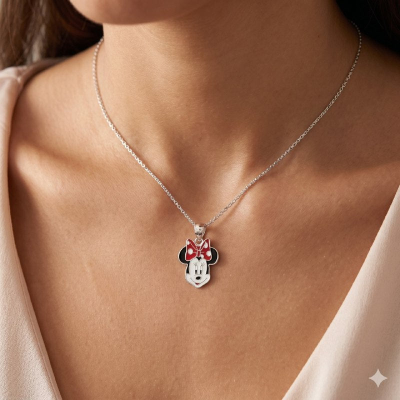 DIJE EN FORMA DE MINNIE MOUSE DE PLATA 9.25 PESO: 3G