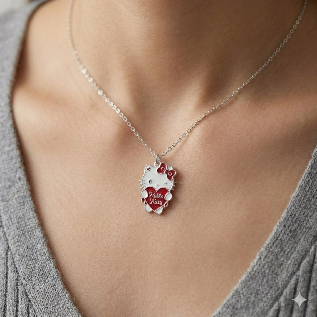 DIJE DE PLATA 9.25 EN FORMA DE HELLO KITTY CON CORAZON 25CM PESO: 3.8G