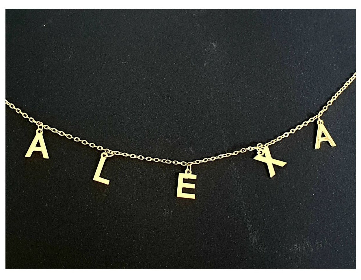 DIJE ACERO ALEXA