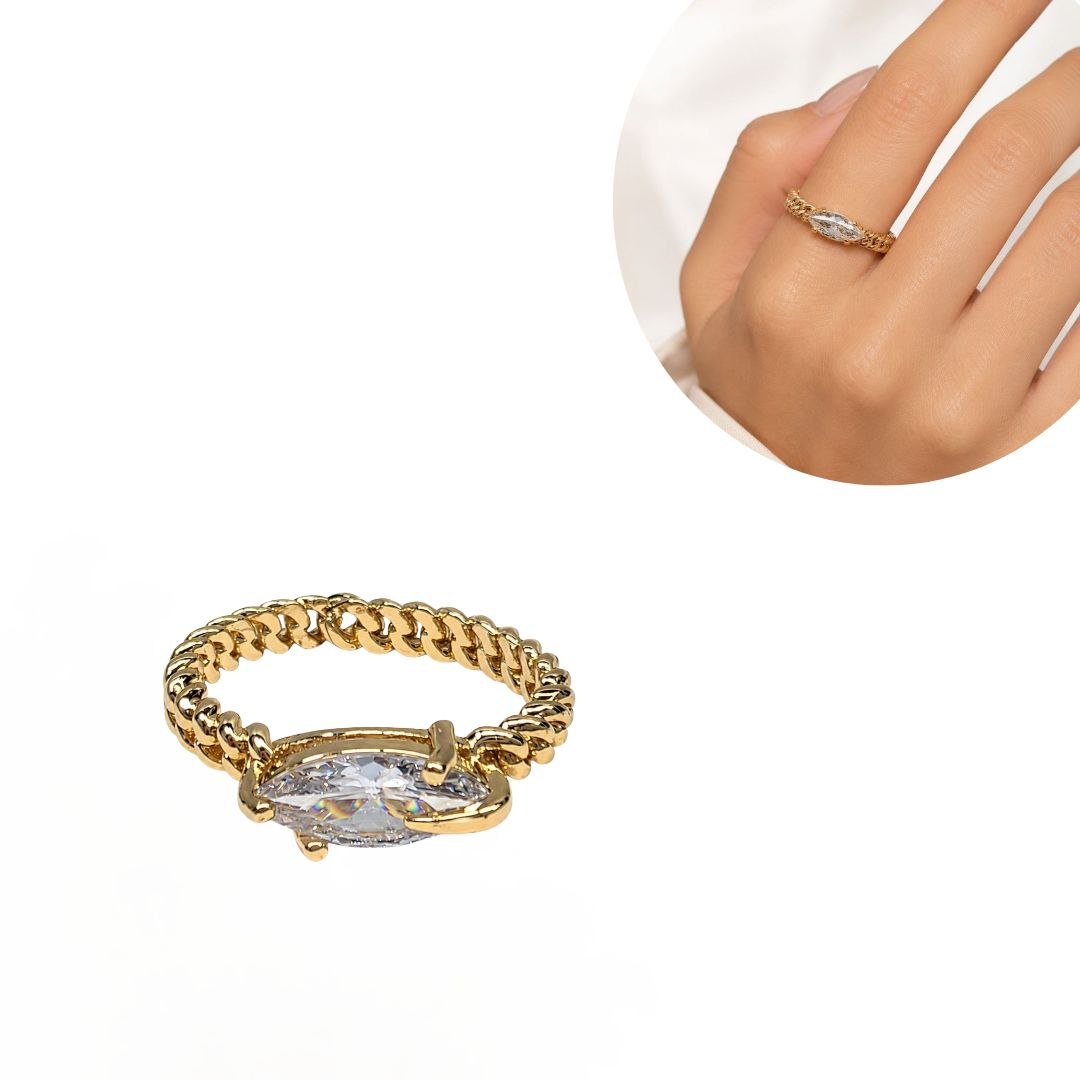 ANILLO DE ENCHAPE PARA DAMA CON CIRCÓN CORTE MARQUESA Y BANDA TIPO CADENA