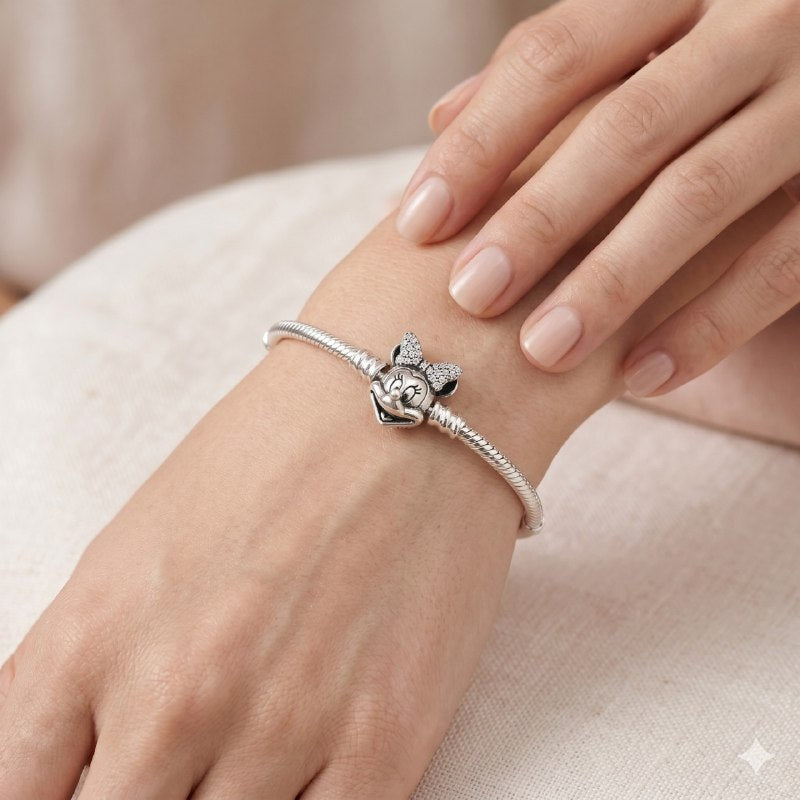 PULSERA EN FORMA DE MINNIE MOUSE PANDORA DE PLATA 9.25 PESO: 15.4G