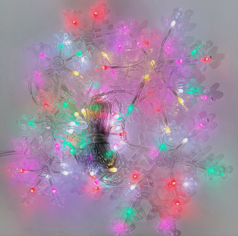 LUCES DECORATIVAS NAVIDEÑAS CORTINA DE LUZ LED MULTICOLOR CON DISEÑO DE COPO DE NIEVE 18.5X11X18.5CM