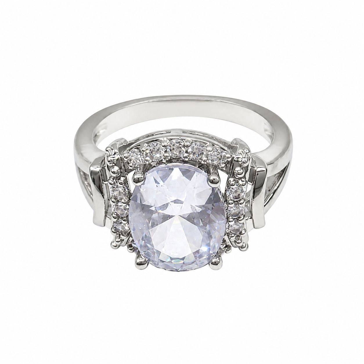 ANILLO DE ENCHAPE PARA DAMA CON CIRCÓN CENTRAL CORTE ÓVALO Y DOBLE HALO LATERAL