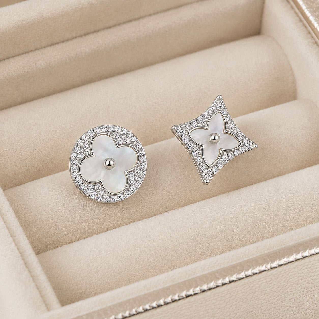 ARETES DE ENCHAPE EN RODIO PARA DAMA ASIMÉTRICOS DE FLOR Y ESTRELLA NÁCAR EN PAVÉ
