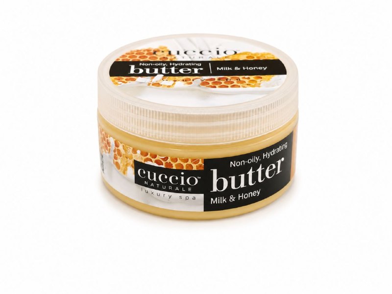 CREMA CORPORAL EXFOLIANTE E HIDRATANTE ILUMINADORA CON AROMA A LECHE Y MIEL CUCCIO 226G