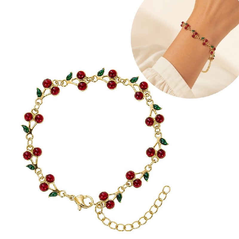 PULSERA DE ENCHAPE PARA DAMA CON DISEÑO DE CEREZAS Y HOJAS EN ESMALTE ROJO Y VERDE