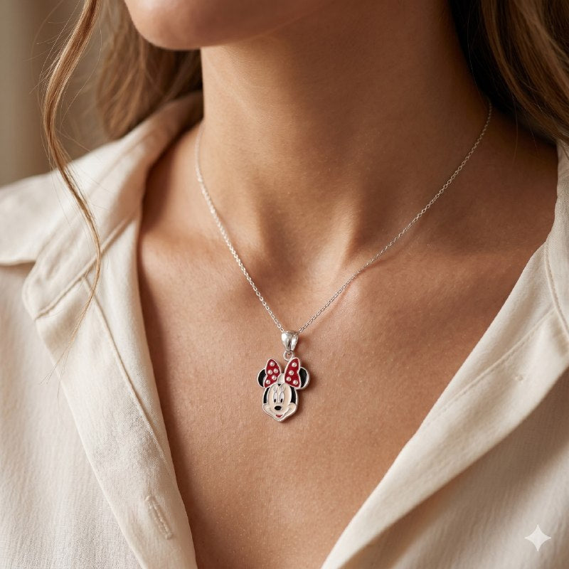 DIJE EN FORMA DE MINNIE MOUSE DE PLATA 9.25 PESO: 3G