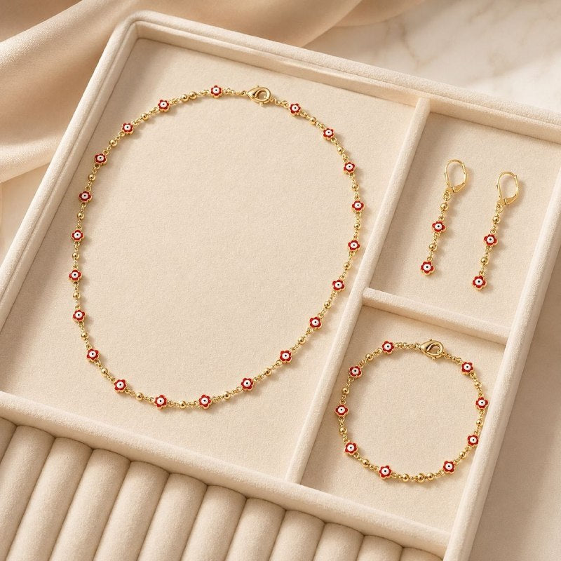 SET DE ENCHAPE PARA DAMA COLLAR, PULSERA Y ARETES MOTIVO OJO TURCO / FLOR ESMALTADA ROJA
