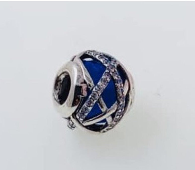 PCHARM1676  CRISTAL AZUL CON CUENTAS AL REDEDOR