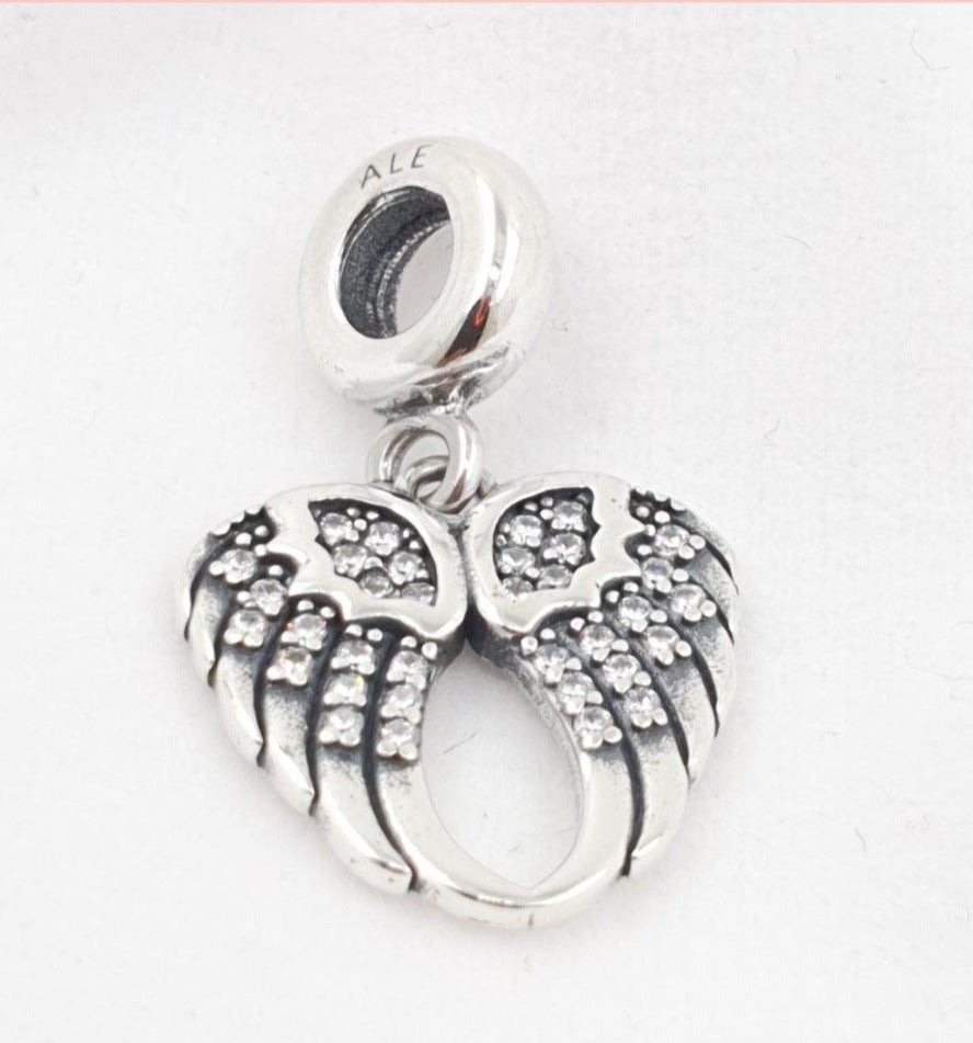 PCHARM2655 COLGANTE DE ALAS CON CIRCONES